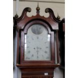An early 19th Century mahogany and oak cased 8 day long case clock with painted arch dial,