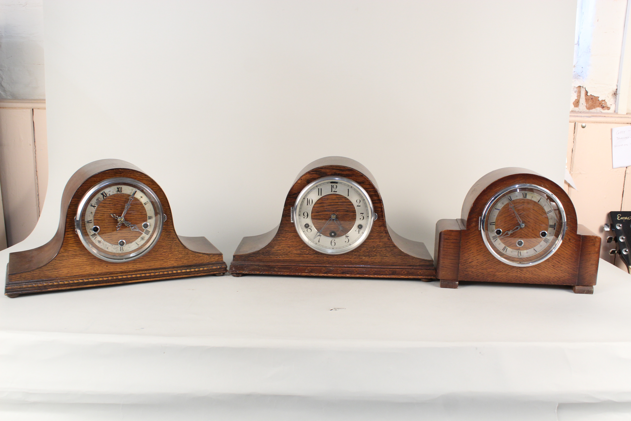 Three assorted 1950's oak mantel clocks