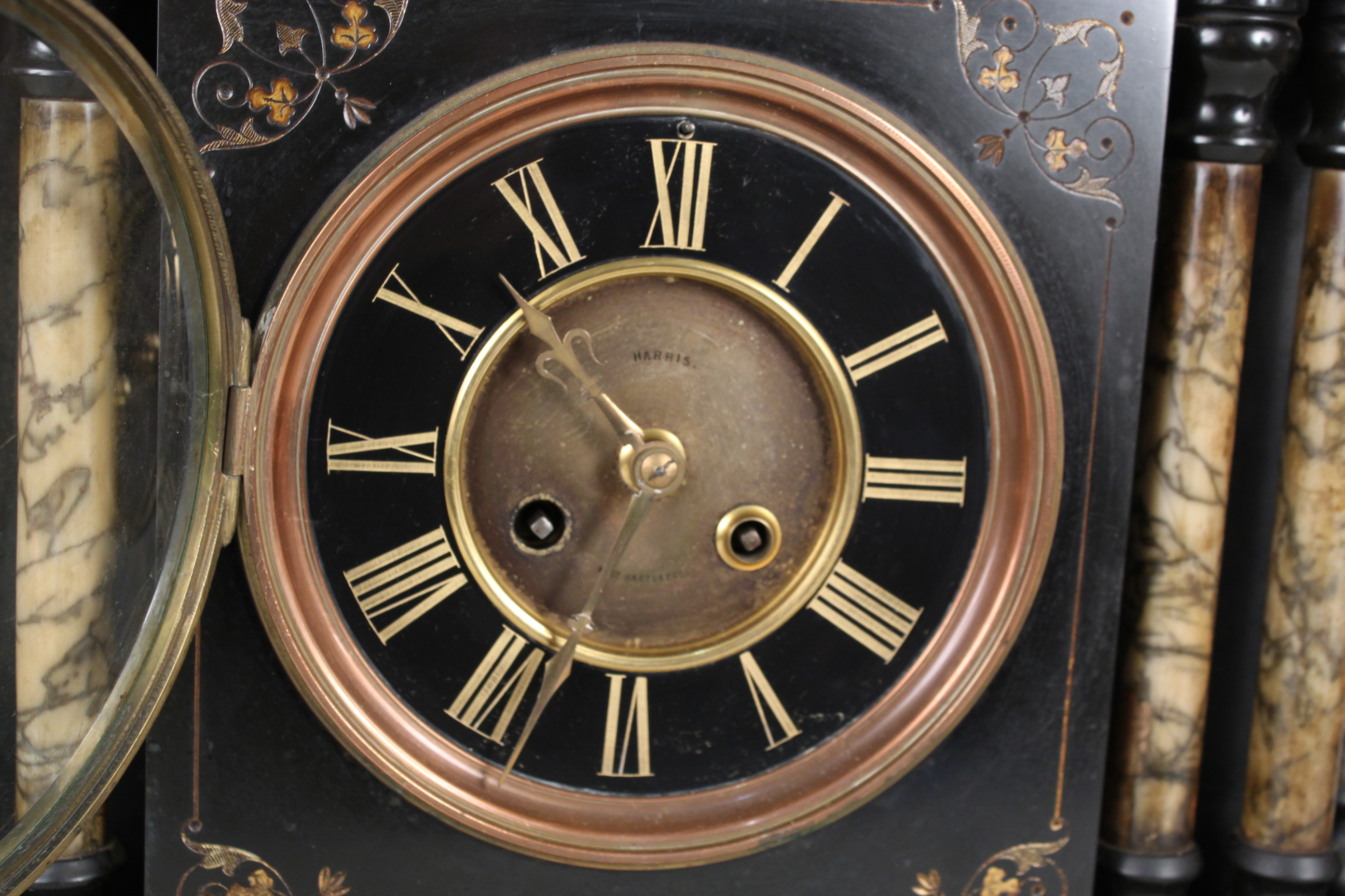A substantial black marble mantel clock with gilt painted decoration and pale marble columns - Image 2 of 3