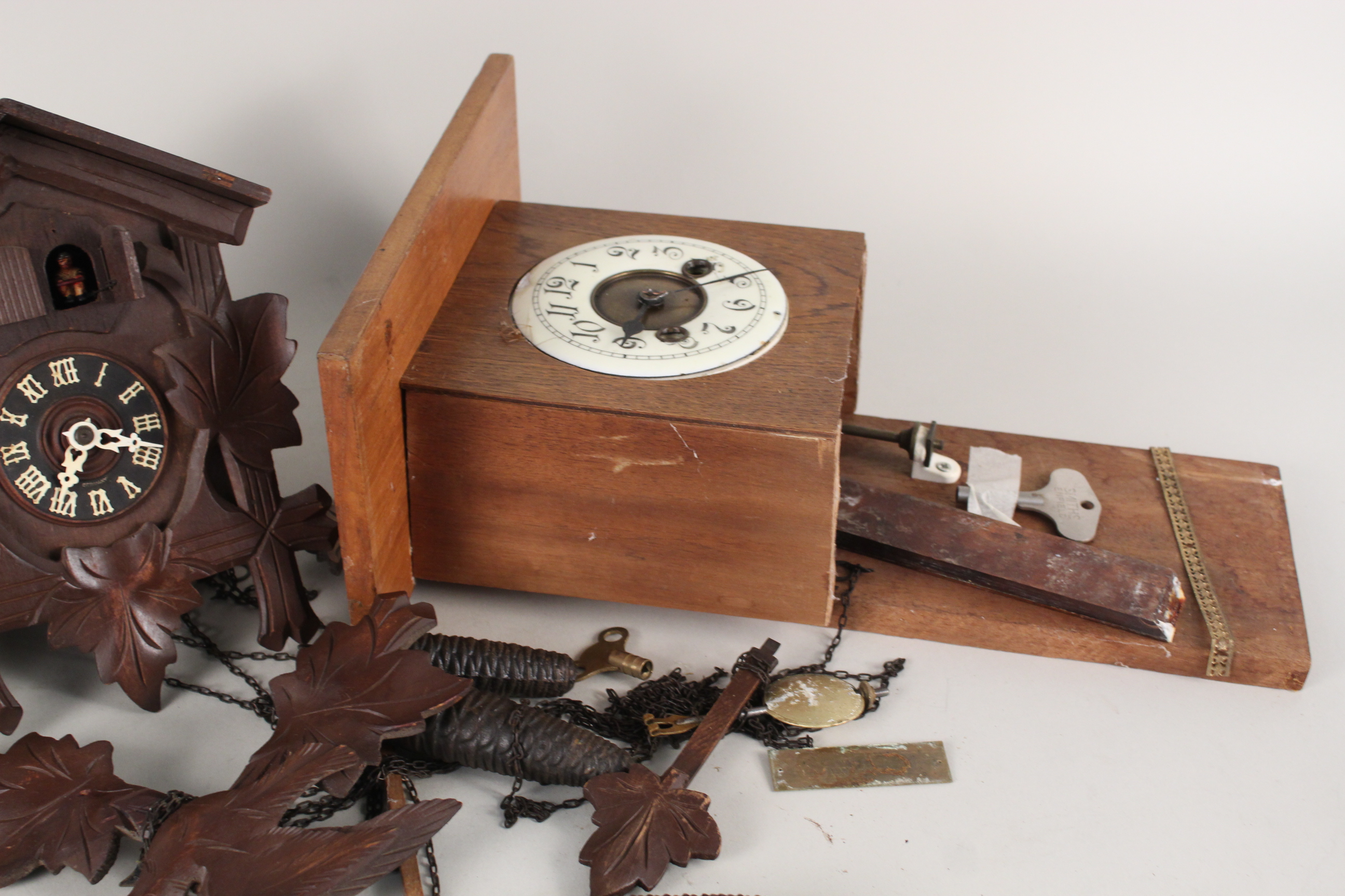 A German cuckoo clock plus two clock mounted movements (as found) - Image 3 of 3