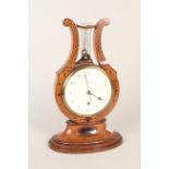 An Edwardian inlaid satinwood mantel lyre clock by J C Jennens & Son,