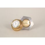 A silver framed travelling clock with a wall mounted brass cased porcelain dial clock