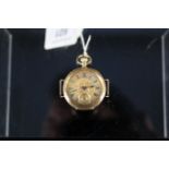 An 18ct gold continental fob watch converted to wristwatch (case stamped Omega)