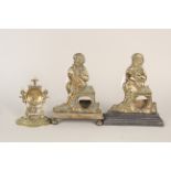 Two similar (but not a pair) 19th Century brass figural pocket watch stands on different bases,