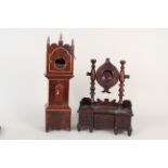 An unusual Victorian mahogany chest of drawers pocket watch stand with three movable drawers,