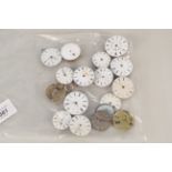 A selection of 19th Century pocket watch dials and movements