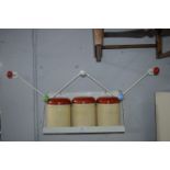 Retro Storage Jars in Wall Mounted Rack plus Coat