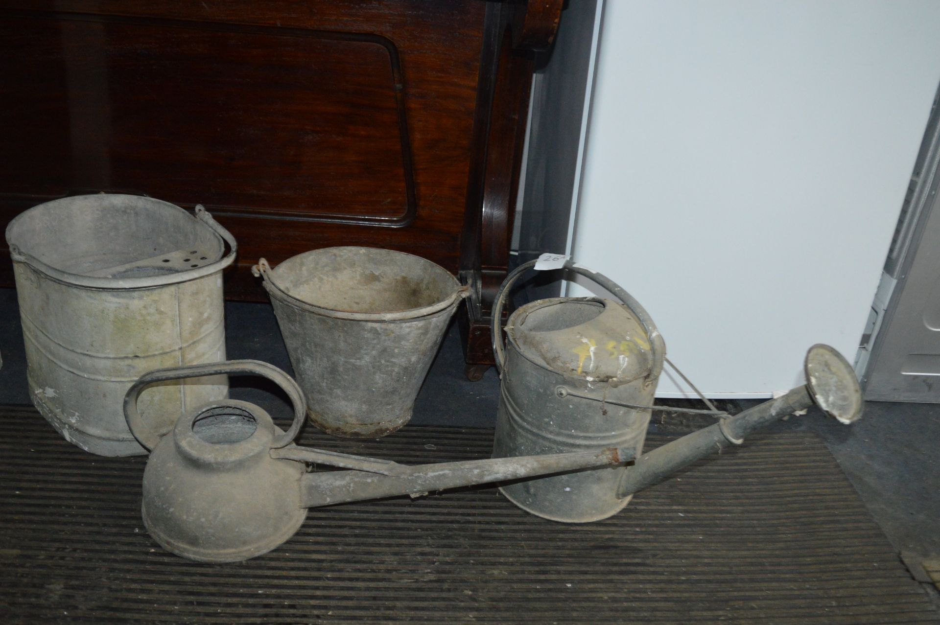 Two Galvanised Metal Watering Cans and Two Buckets