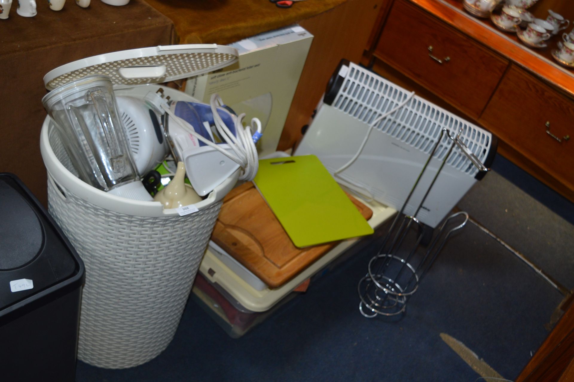 Laundry Basket Containing Kitchenware, Toilet Seat