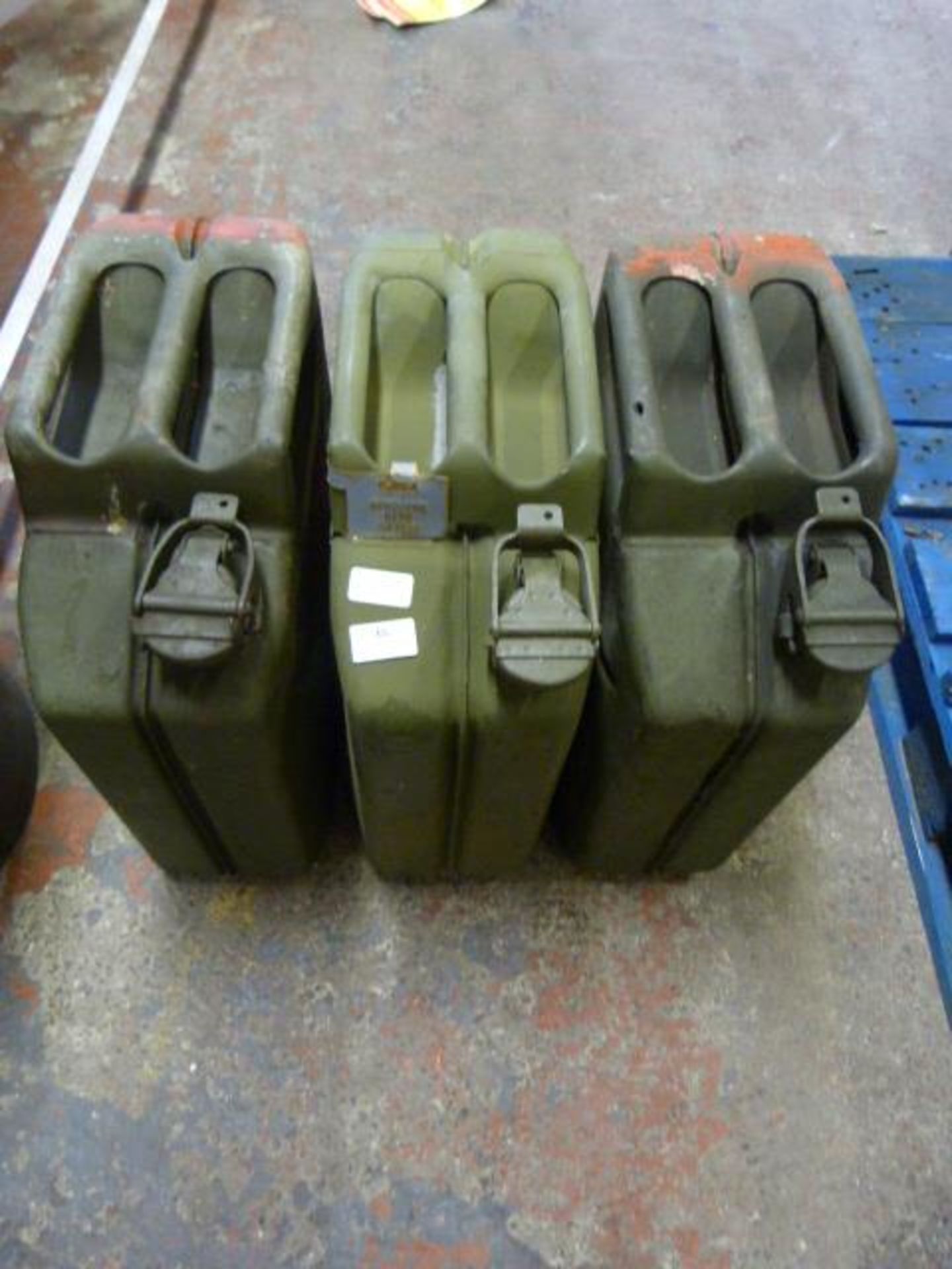 *Three Jerry Cans (One Full of Diesel)