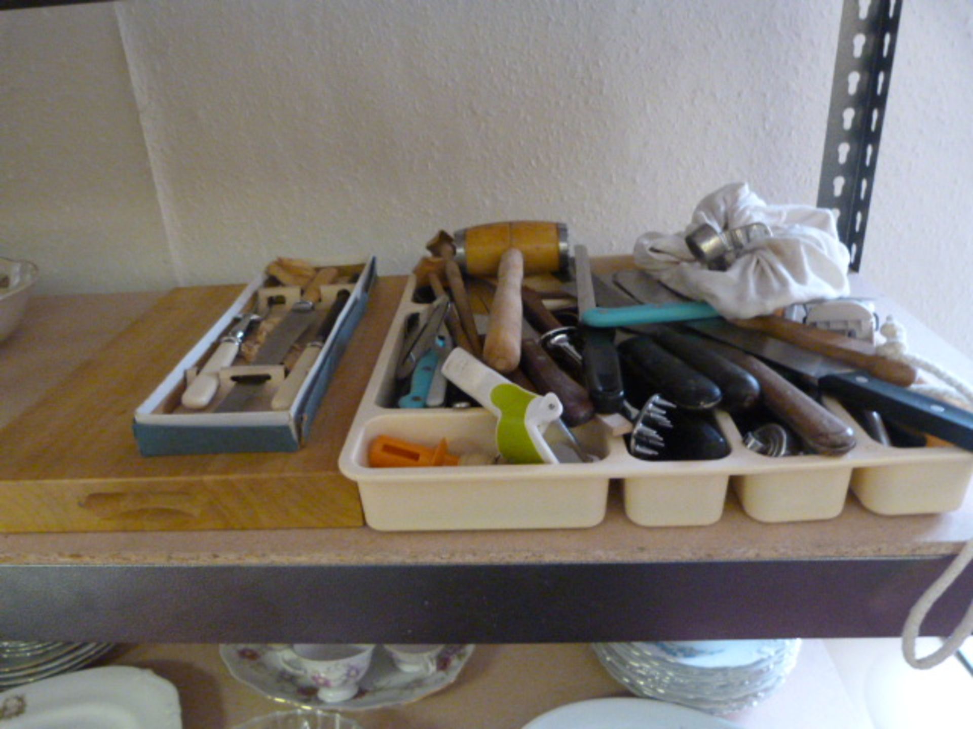 Chopping Board and a Quantity of Kitchen Utensils