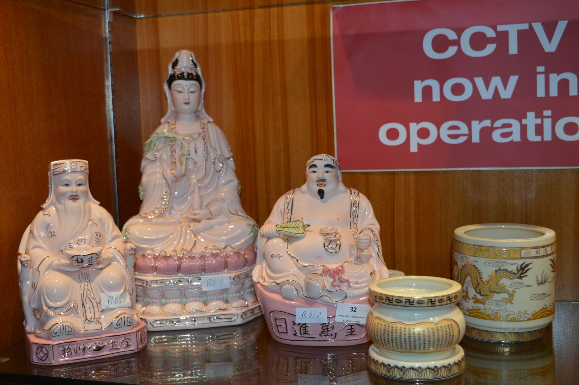 Two Pottery Buddha and a Figure of Krishna