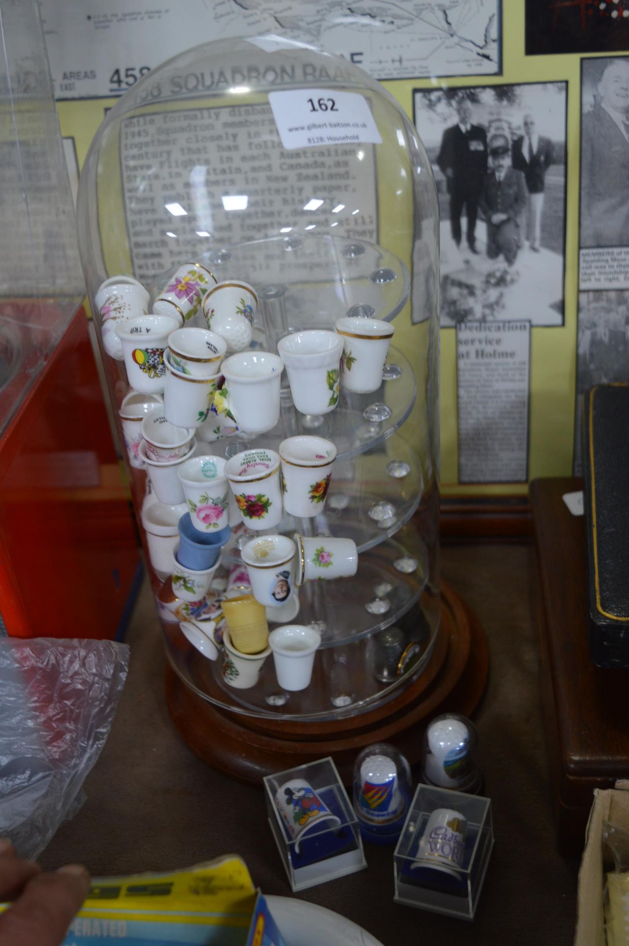 Collection of Thimbles in a Display Case