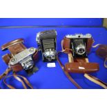 Three Vintage Cameras Including Zeiss and Solida