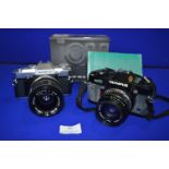 Olympus OM30 and OM40 Cameras with Olympus Lenses