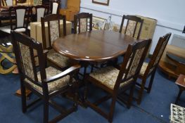 Dark Oak Oval Dining Table with Six Floral Upholst