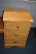 Three Drawer Pine Effect Bedside Cabinet