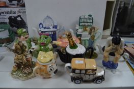 Ten Novelty Teapots and a Figurine