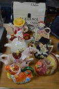 *Nine Novelty Teapots and a Case