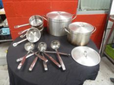 * 8x high quality vogue ladels, 5x vogue saucepans, 1x large and 1x medium stainless steel pans