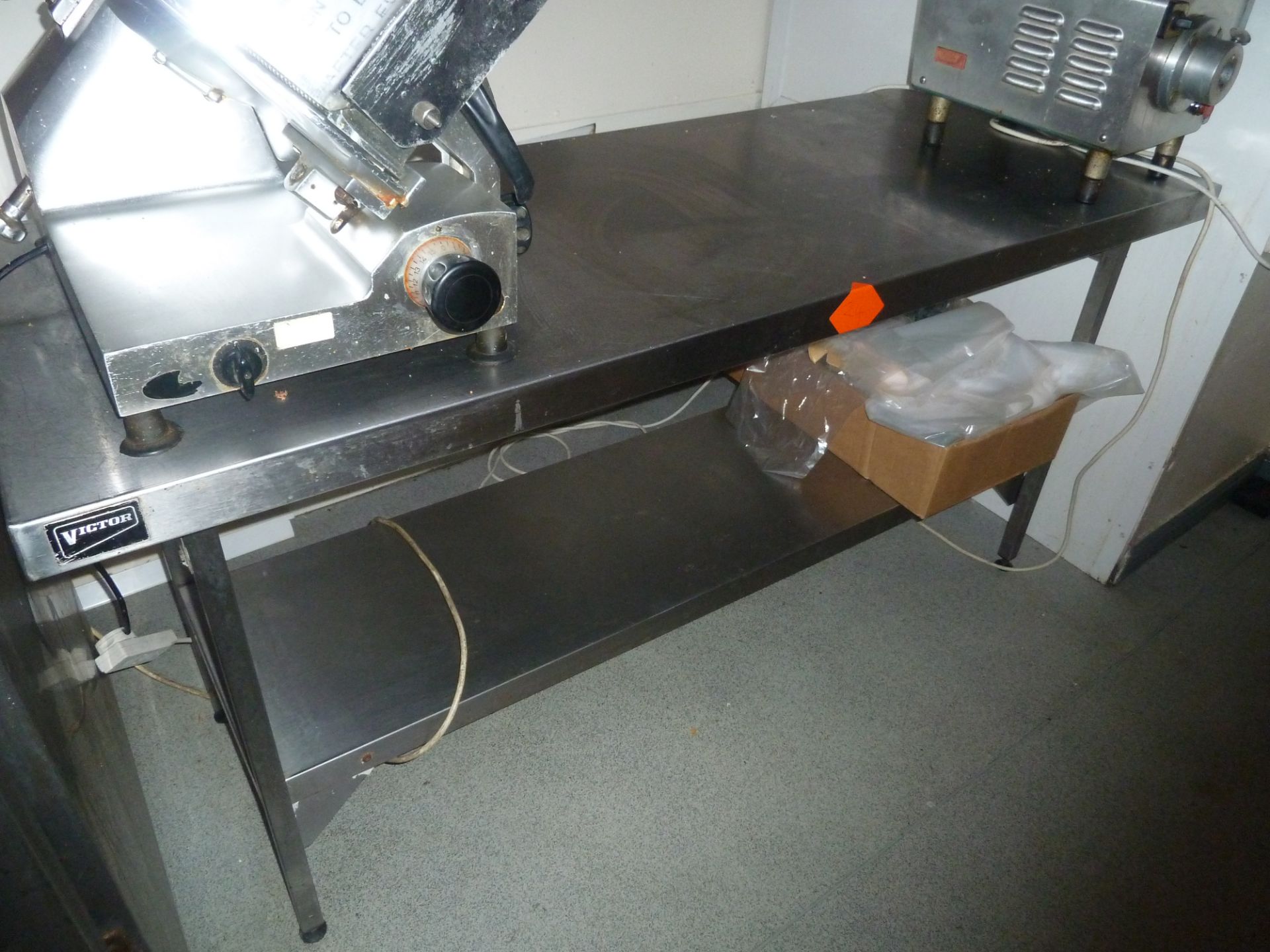 * Stainless steel prep bench in good condition (180L X 86H X 65D)