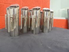 * Set of 8 matching quality stainless steel jugs.