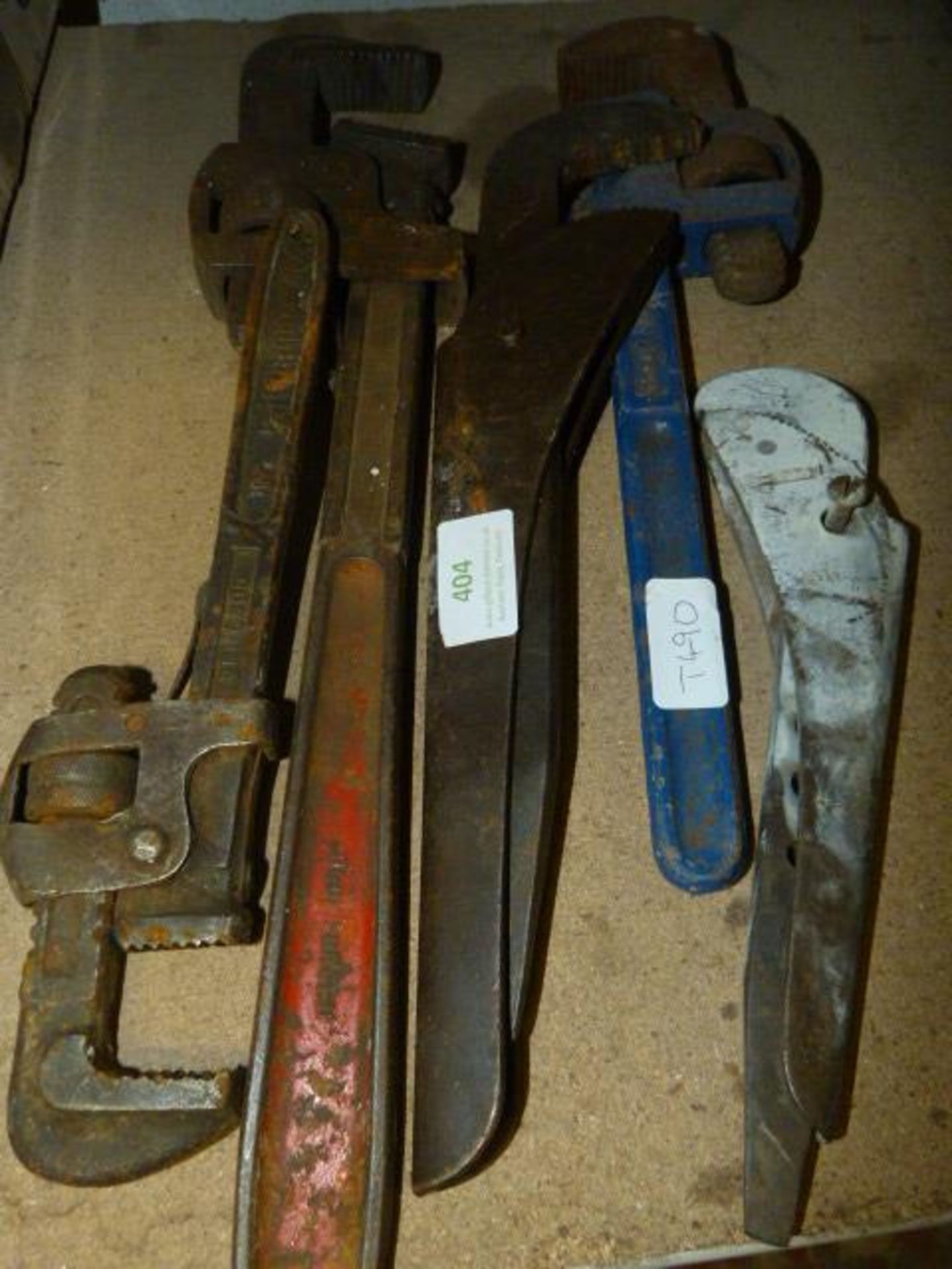 Three Stillsons and Two Pipe Wrenches