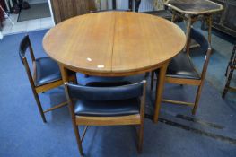 Mcintosh Circular Teak Dining Table with Four Leatherette Upholstered Chairs