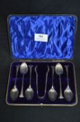 Cased Set of Six Silver Teaspoons and a Pair of Sugars Tongs