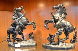 Pair of Painted Spelter Figures with Wild Stallions