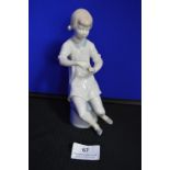 Porcelain Figure of a Young Girl