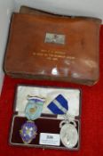 Two Hallmarked Silver Masonic Medals and a Cased Apron