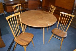 Ercol Elm Oval Drop Leaf Dining Table with Four Spindle Back Chairs