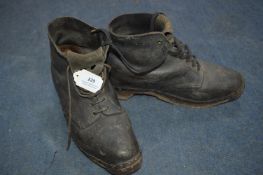 Pair of Clog Soled Boots