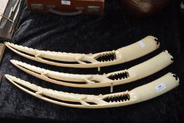 Three Carved Ivory Tusks in the Form of Crocodiles