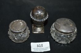 Two Glass Pots with Silver Lids, and a Silver Pepper Pot