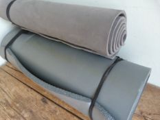 Two Grey Sleeping Mats