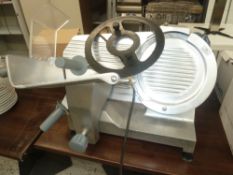 * High quality meat slicer, complete with all attachments.