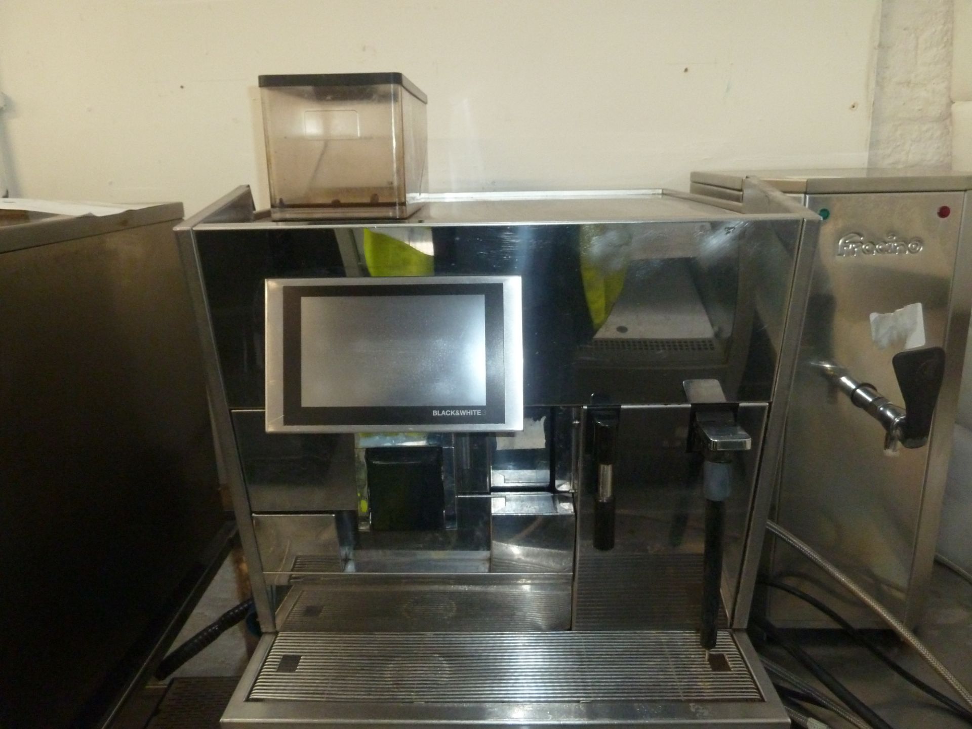 * bean to coffee machine. Black and white ctm3 .This machine is direct from national chain. The