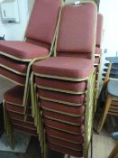 *Thirty Two Upholstered Metal Framed Stacking Chairs