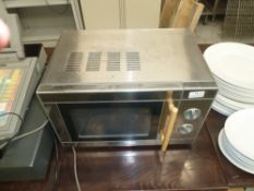 * Hinari Silver domestic microwave oven, good condition, tested.