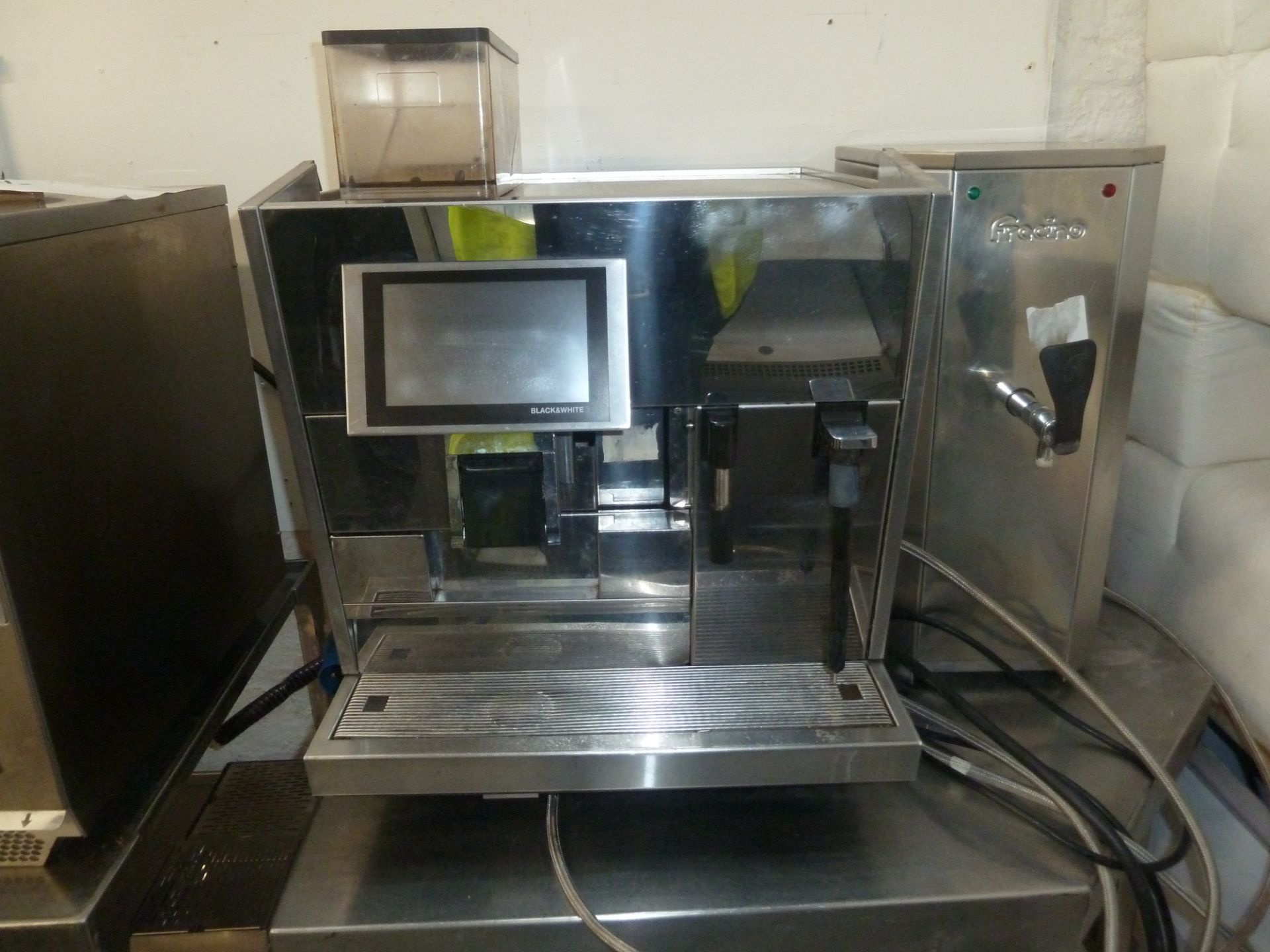 * bean to coffee machine. Black and white ctm3 .This machine is direct from national chain. The - Image 2 of 6