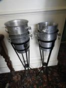 *Two Wrought Iron Wine Bucket Stands and Five Ice Buckets