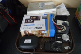 Digital Cameras by Canon, Pentax, Olympus, etc.