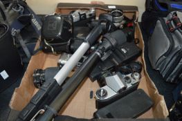 Assorted Cameras and Monopods, Lens, etc.