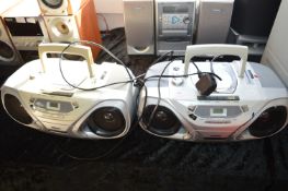 Two Philips Portable Music Player