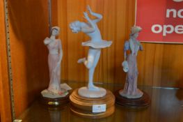 Three Figurines Including a Figure Skater