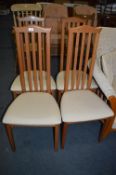 Four High Back Slatted Dining Chairs
