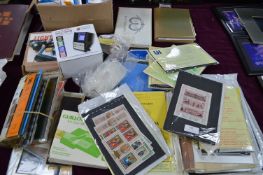 Assorted Stamps and Stamp Collecting Accessories,