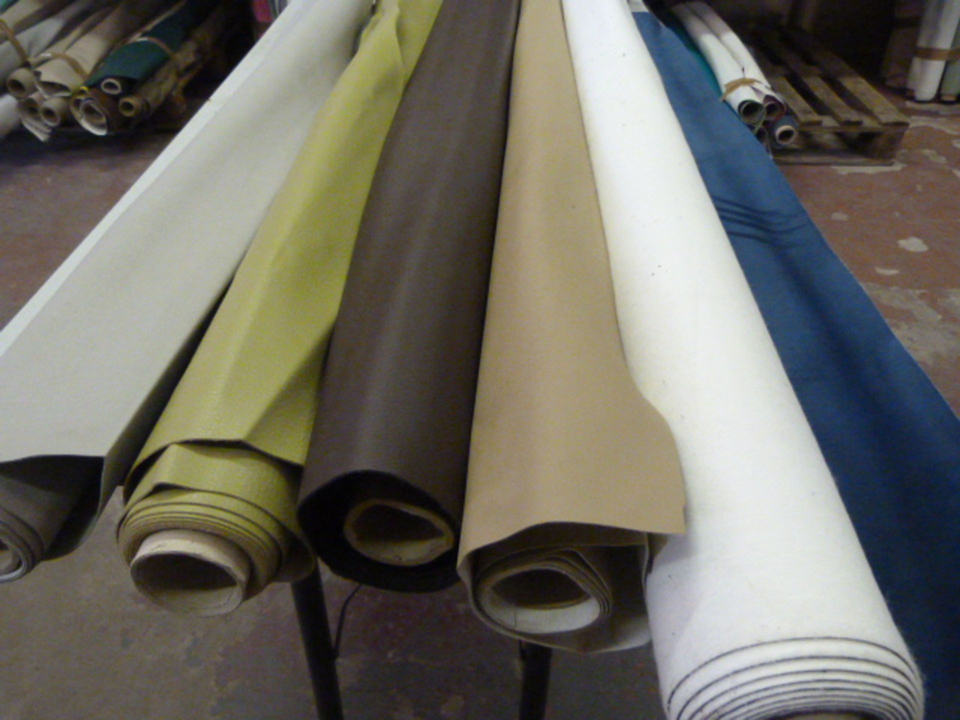 *Five Small Rolls of Leatherette & Various Upholstery Cloth